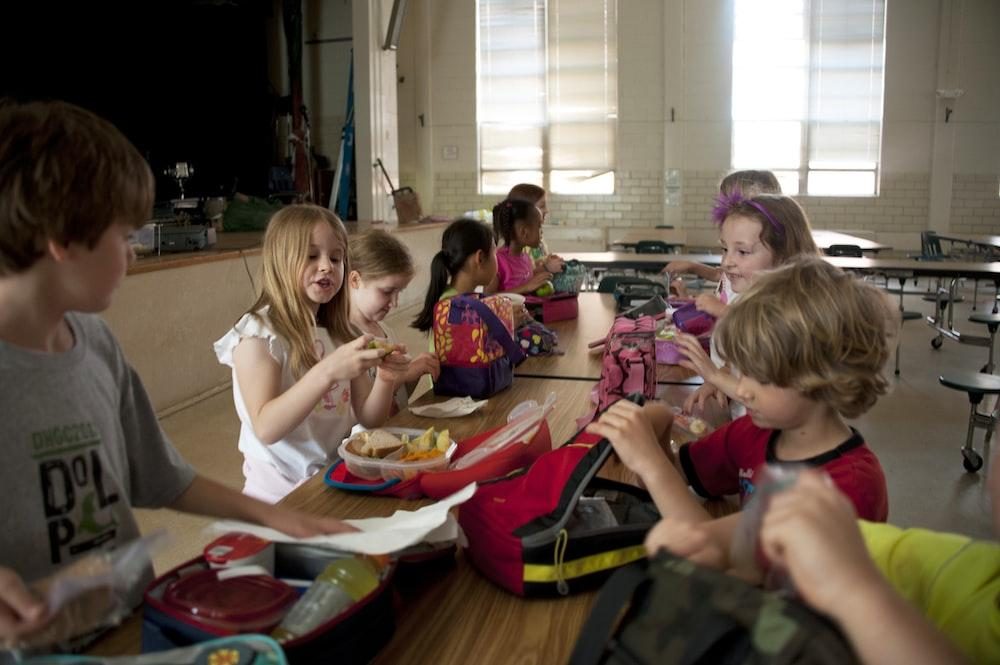 Children enjoying lunch in the cafeteria