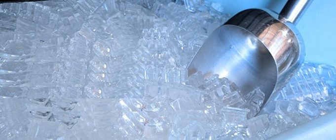 An image of scooping ice from an ice maker