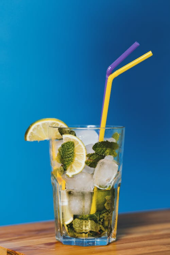 A drink with two straws.