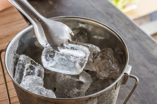An image of ice cubes in a steel container