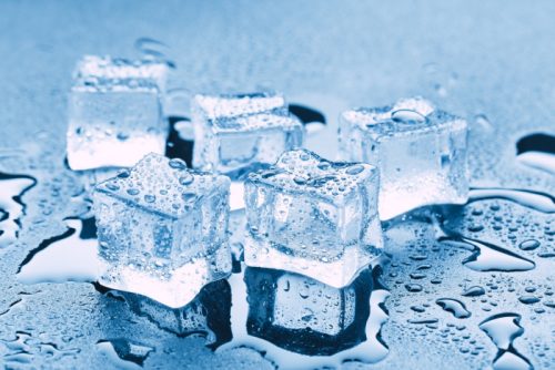 An image of ice cubes and water around them
