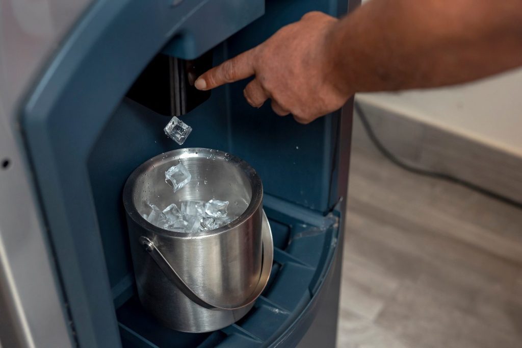 an ice machine with a water dispenser in an office